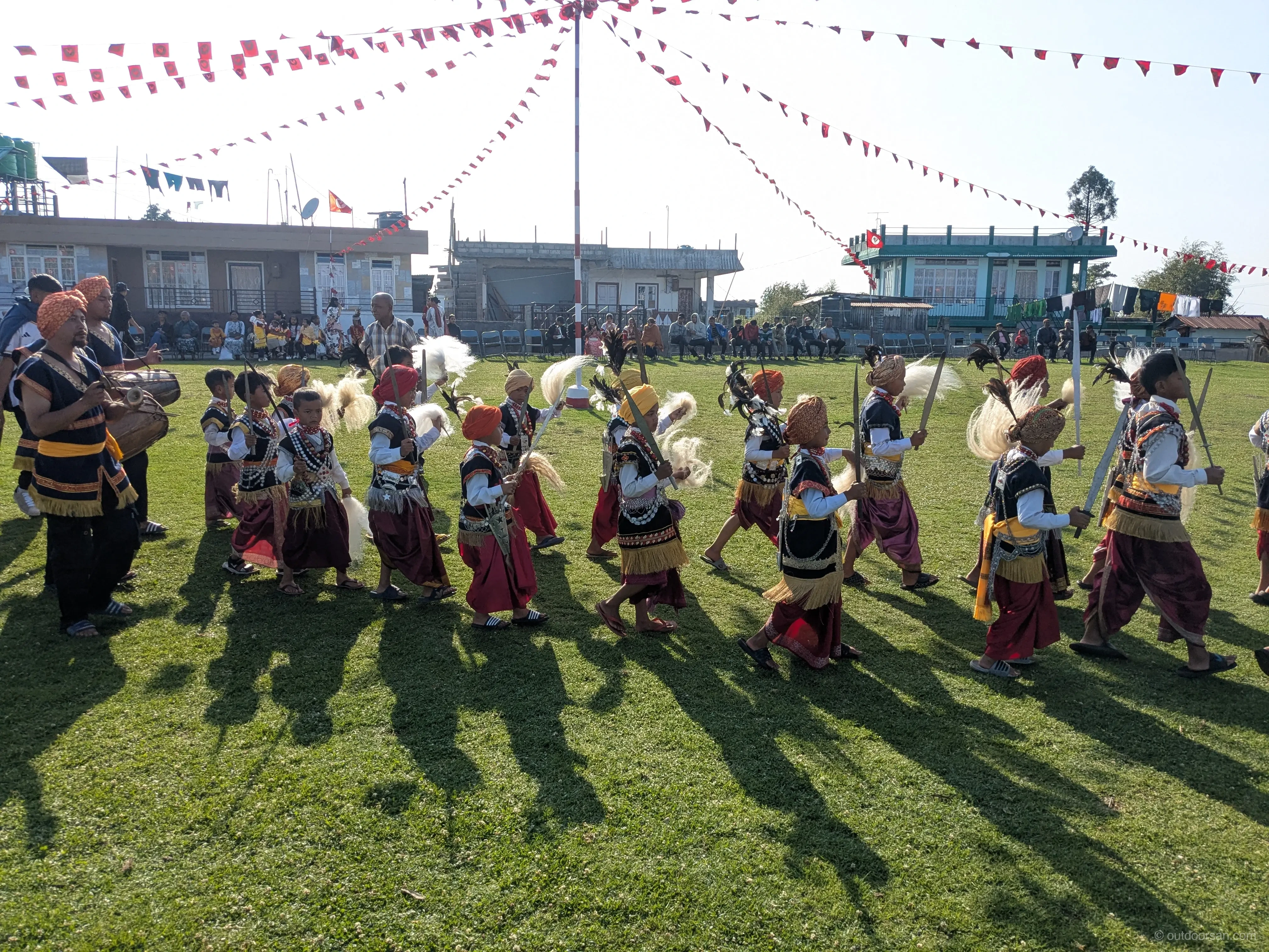 Children and young adults performing in a festival