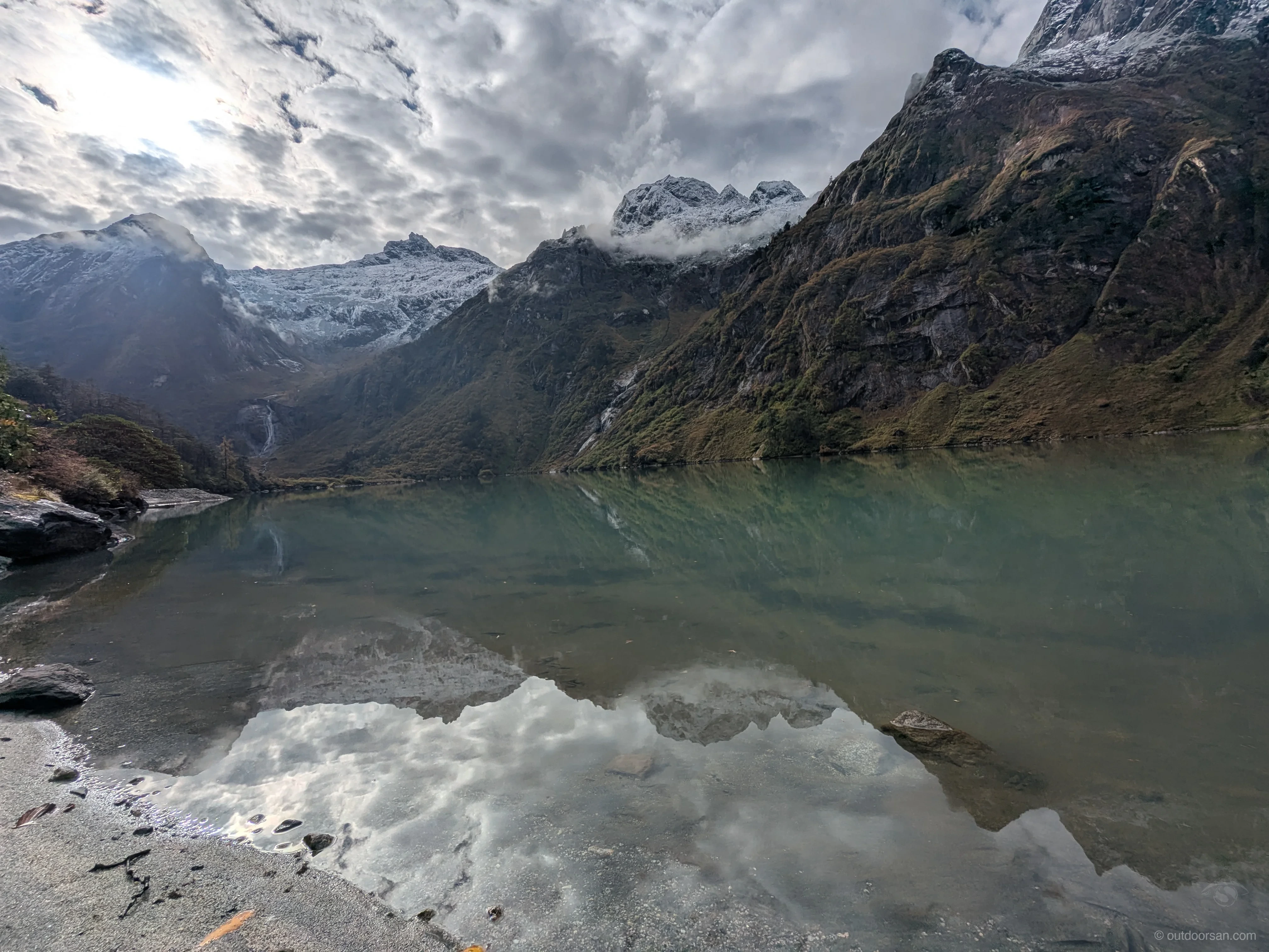 Another view of Lake 2 from base camp with a ring of snow capped mountains