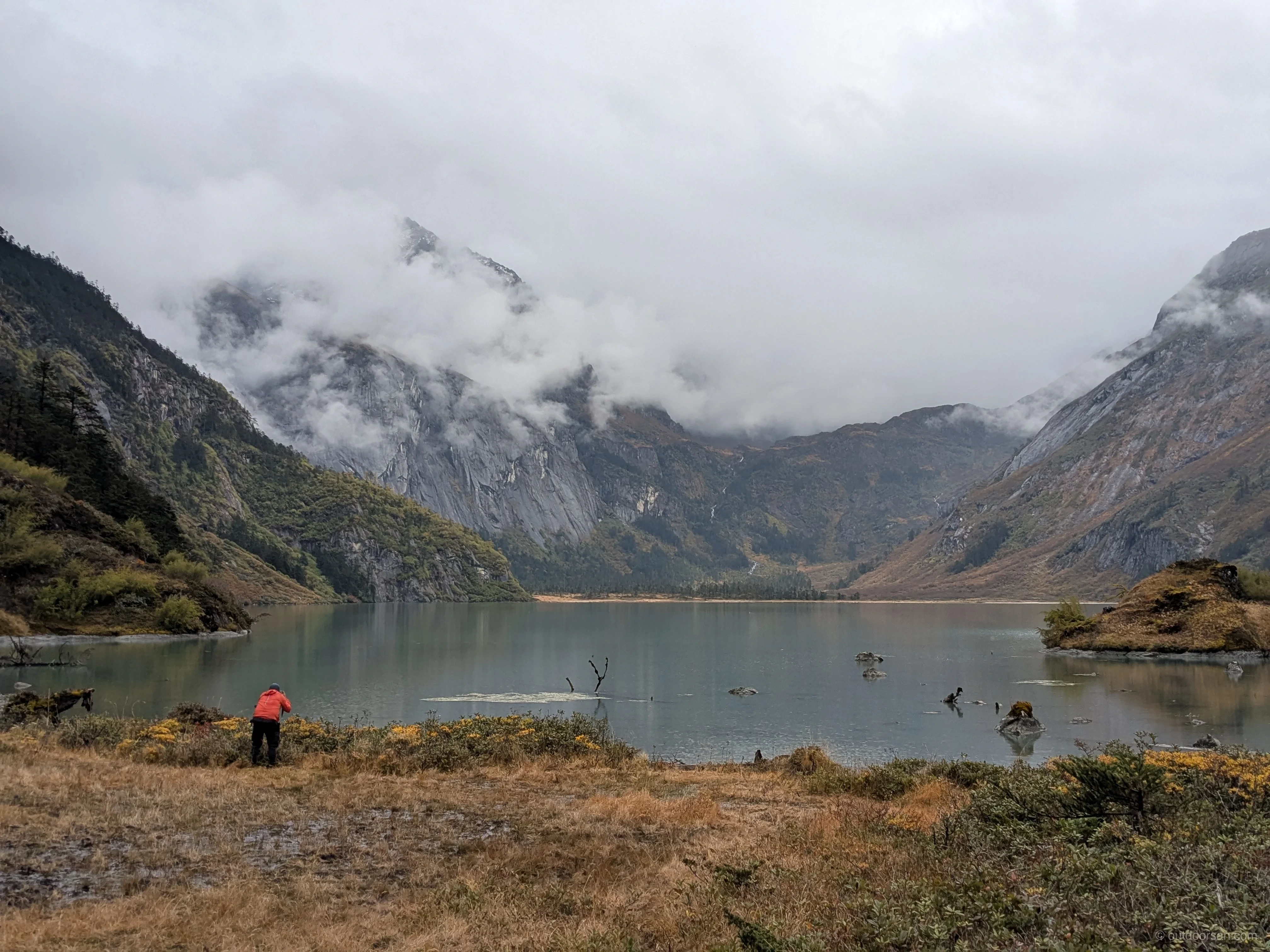 Pristine alpine lake 4 reflecting forest and mountains in Aeyo Valley
